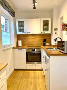 Η κουζίνα ή μικρή κουζίνα στο Schönes Sylt-Apartement "Waihüs" im ruhigen Alt-Westerland