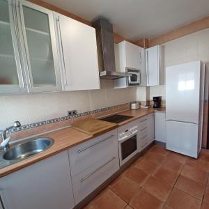 Kuchyň nebo kuchyňský kout v ubytování Villa TRANQUILA