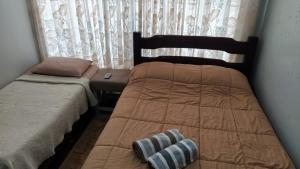 Postel nebo postele na pokoji v ubytování Flat Central