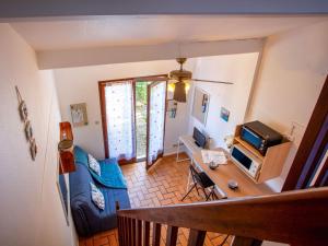 a living room with a couch and a table at Holiday Home Plein Océan-4 by Interhome in Pornic