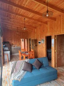 Prostor za sedenje u objektu Cabaña Moebius Conaripe