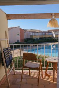 Rõdu või terrass majutusasutuses CAPAO Beach Hôtel