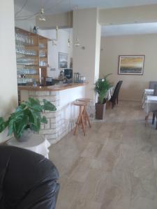 Posezení v ubytování Guest House Palme
