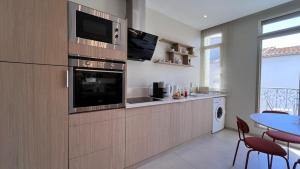 Kuchyň nebo kuchyňský kout v ubytování Le vintage