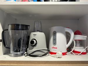 two appliances sitting on top of a kitchen counter at Cozy Studio in Rabat City Center in Rabat