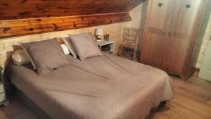 Postel nebo postele na pokoji v ubytování Gîte Des Sapins