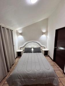 Katil atau katil-katil dalam bilik di Central Petit Apartment