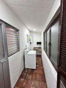 Dapur atau dapur kecil di Central Petit Apartment