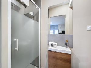 Et badeværelse på Appartement tout neuf 4 pers N3