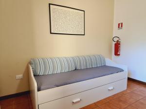 Posteľ alebo postele v izbe v ubytovaní Caletta Apartments