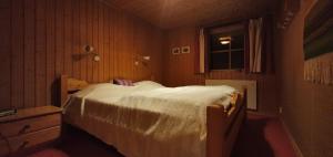 Ένα ή περισσότερα κρεβάτια σε δωμάτιο στο Sauna | Wi-Fi | Terrace | Wood stove | Cable TV