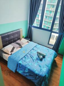 Ένα ή περισσότερα κρεβάτια σε δωμάτιο στο Little ching homestay vivacity jazz 3