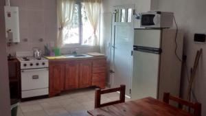 Η κουζίνα ή μικρή κουζίνα στο Casita de Arena Cabañas