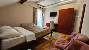 Postel nebo postele na pokoji v ubytování Hotel Koliba na Grza