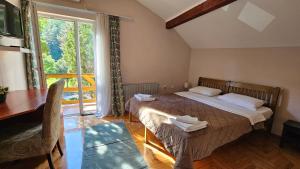 Postel nebo postele na pokoji v ubytování Hotel Koliba na Grza + 37 fotografií