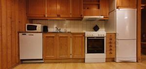 Η κουζίνα ή μικρή κουζίνα στο Sauna | Wi-Fi | Terrace | Wood stove | Cable TV