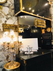 a dressing room with a counter and a mirror at Zee Hotel in Dubai