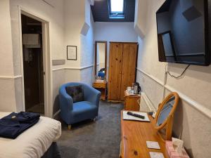 Μια τηλεόραση ή/και κέντρο ψυχαγωγίας στο Barclay Guest House +38 φωτογραφίες