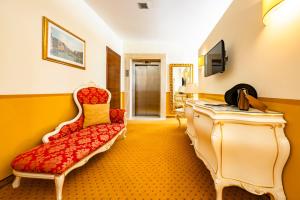 TV a/nebo společenská místnost v ubytování Il Gentiluomo Hotel & SPA