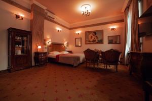 Postel nebo postele na pokoji v ubytování Hotel Ambasada Bolesławiec + 37 fotografií