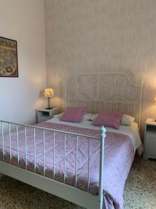 Posteľ alebo postele v izbe v ubytovaní La casa di Chicca + 25 fotografií