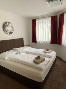 Postel nebo postele na pokoji v ubytování Appartement Silbermond