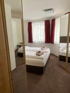 Postel nebo postele na pokoji v ubytování Appartement Silbermond