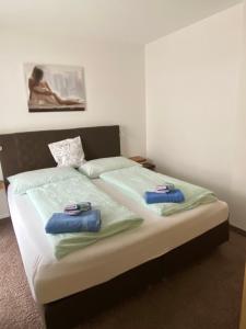 Postel nebo postele na pokoji v ubytování Appartement Silbermond