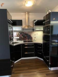 Kuchyň nebo kuchyňský kout v ubytování Appartement Silbermond