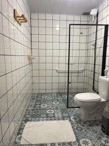 Koupelna v ubytování Grand'Hostel