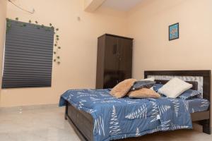 Voodi või voodid majutusasutuse Charter Stays 3BHK Luxurious Flat in Manikonda toas