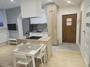 Kuchyňa alebo kuchynka v ubytovaní Urban Jungle Apartment in the city center