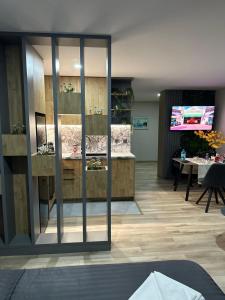 a lobby with a large glass wall at July apartaments in Velingrad
