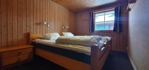 Ένα ή περισσότερα κρεβάτια σε δωμάτιο στο Sauna | Wi-Fi | Terrace | Wood stove | Cable TV +5 φωτογραφίες