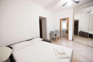 Postel nebo postele na pokoji v ubytování Magnifico Loft in Zona Udine M2