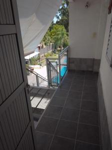 a view from the hallway of a house with a tile floor at Casas Ña Zuna depto 6 in Concepción del Uruguay