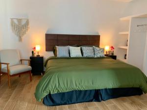 Ένα ή περισσότερα κρεβάτια σε δωμάτιο στο Mar y Chelo Luxury Aparments +70 φωτογραφίες