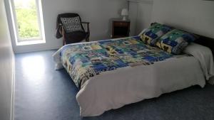 Katil atau katil-katil dalam bilik di Superbe appartement à Seyssuel