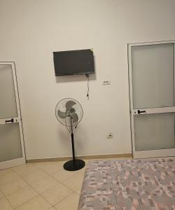 Televiisor ja/või meelelahutuskeskus majutusasutuses Tafaj Studio Flat private