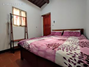 Postel nebo postele na pokoji v ubytování Lieyu B&B