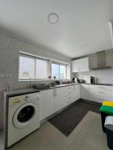 Køkken eller tekøkken på Casa do Rosário - Ribeira Grande + 18 billeder