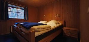 Ένα ή περισσότερα κρεβάτια σε δωμάτιο στο Sauna | Wi-Fi | Terrace | Wood stove | Cable TV