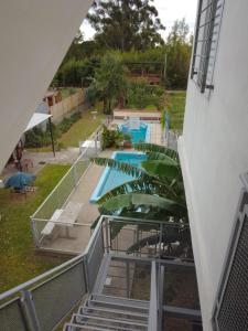 Bazén v ubytování Casas Ña Zuna depto 10 nebo v jeho okolí