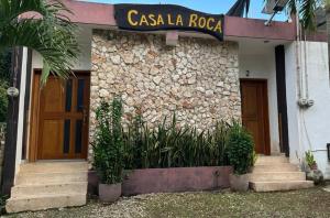 a building with a sign that reads casa rocca at Casa la Roca Valladolid in Valladolid +8 photos