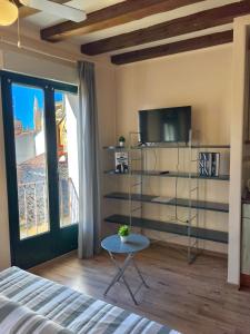 Ένα ή περισσότερα κρεβάτια σε δωμάτιο στο Apartamento en Plaza Mayor de Segovia
