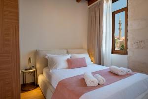 A bed or beds in a room at Casa Del Balsamo