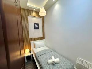 Postel nebo postele na pokoji v ubytování Destination Partition Room in Tecom Near Metro + 37 fotografií