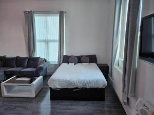 Postel nebo postele na pokoji v ubytování Anfield Contractors Accommodation