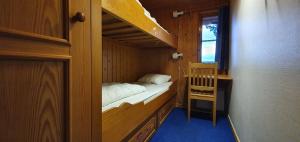 Postel nebo postele na pokoji v ubytování Sauna | Wi-Fi | Terrace | Wood stove | Cable TV