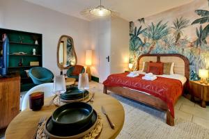 Ένα ή περισσότερα κρεβάτια σε δωμάτιο στο Studio Bali en hyper centre by PrimoConciergerie